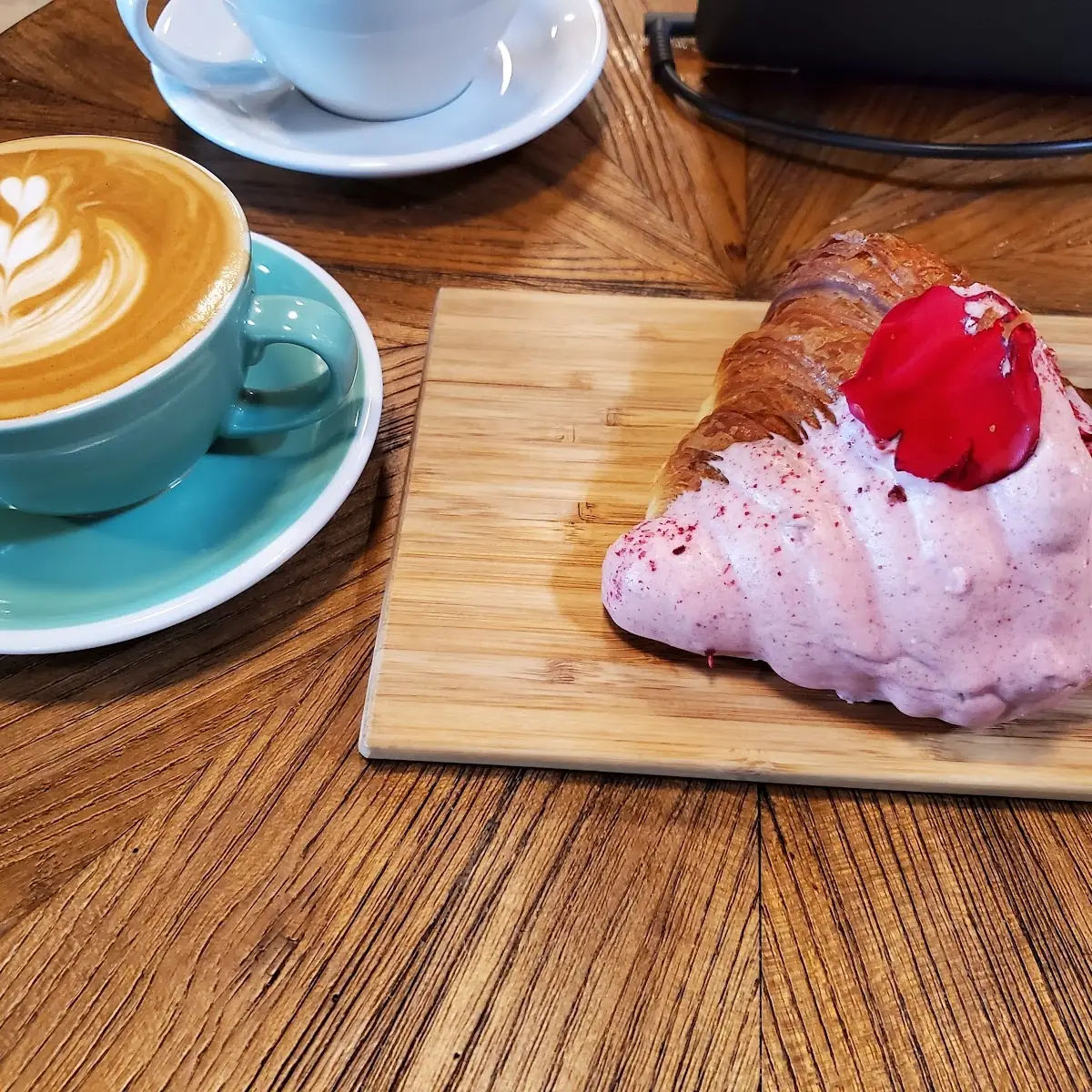 Cappuccino and a Raspberry Rose Croissant