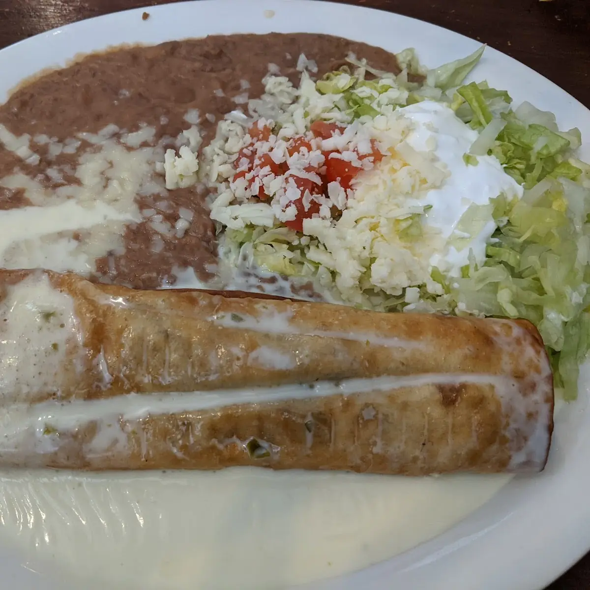Enchilada Chile Relleno Rice and Beans Combo