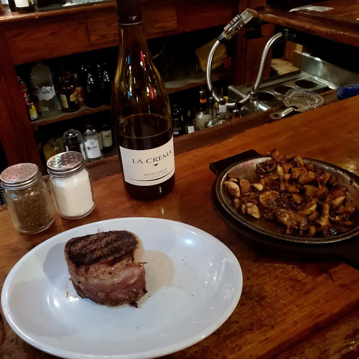 Bacon Wrapped Filet and Sautéed Mushrooms