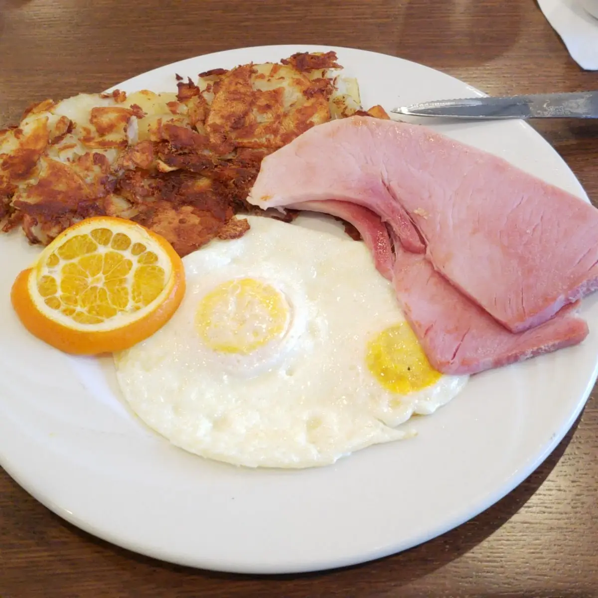 Classic Bacon and Eggs over Easy with Hash Browns
