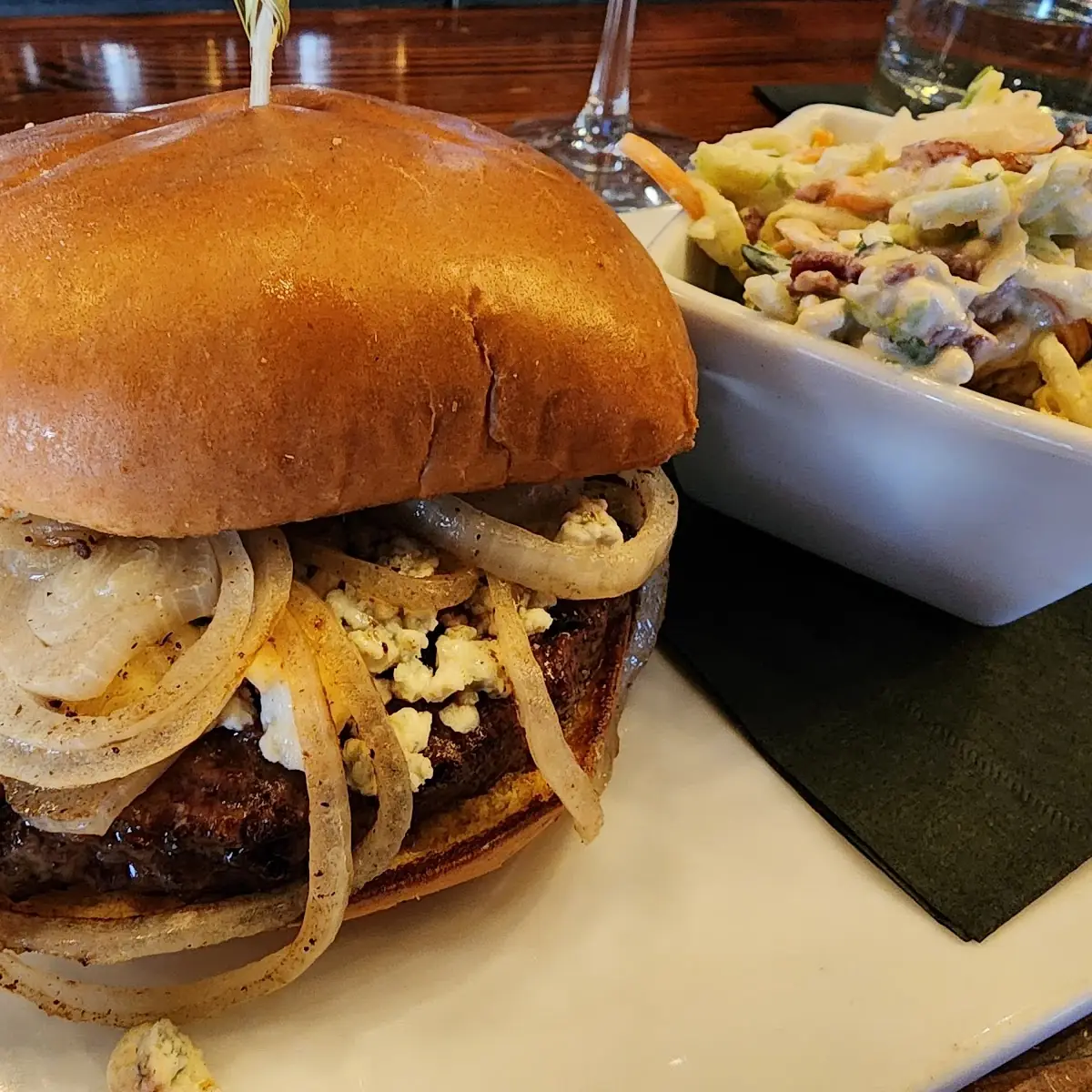 Burger with Blue Cheese Crumbles and Grilled Onions