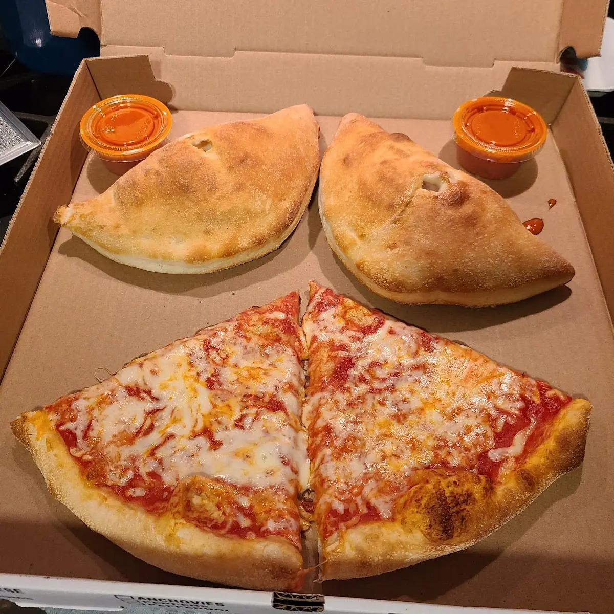 Cheese Pizza and Calzones