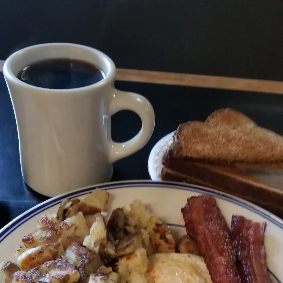 3 Eggs over Medium with Bacon Hash Browns and Toast