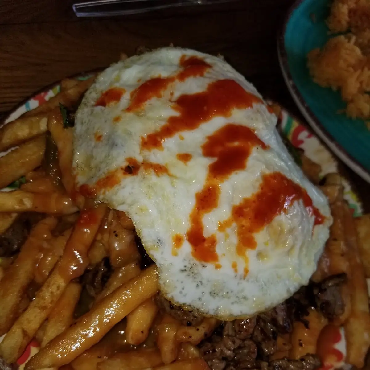 Asada Fries with Eggs Benedict
