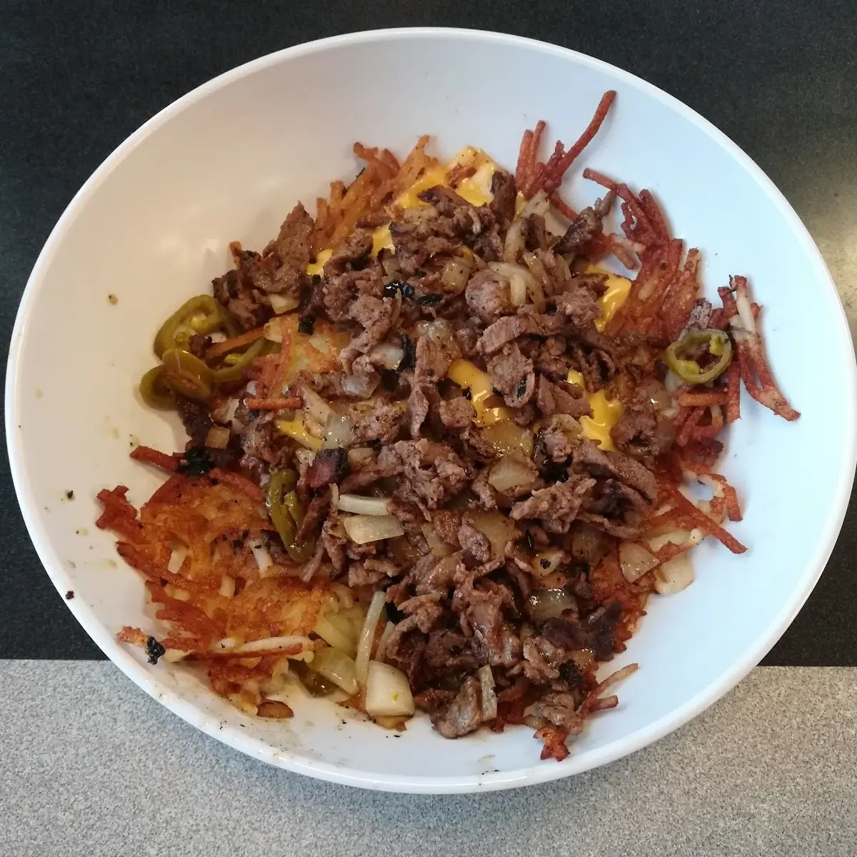 Cheese Steak Melt Hash Brown Bowl