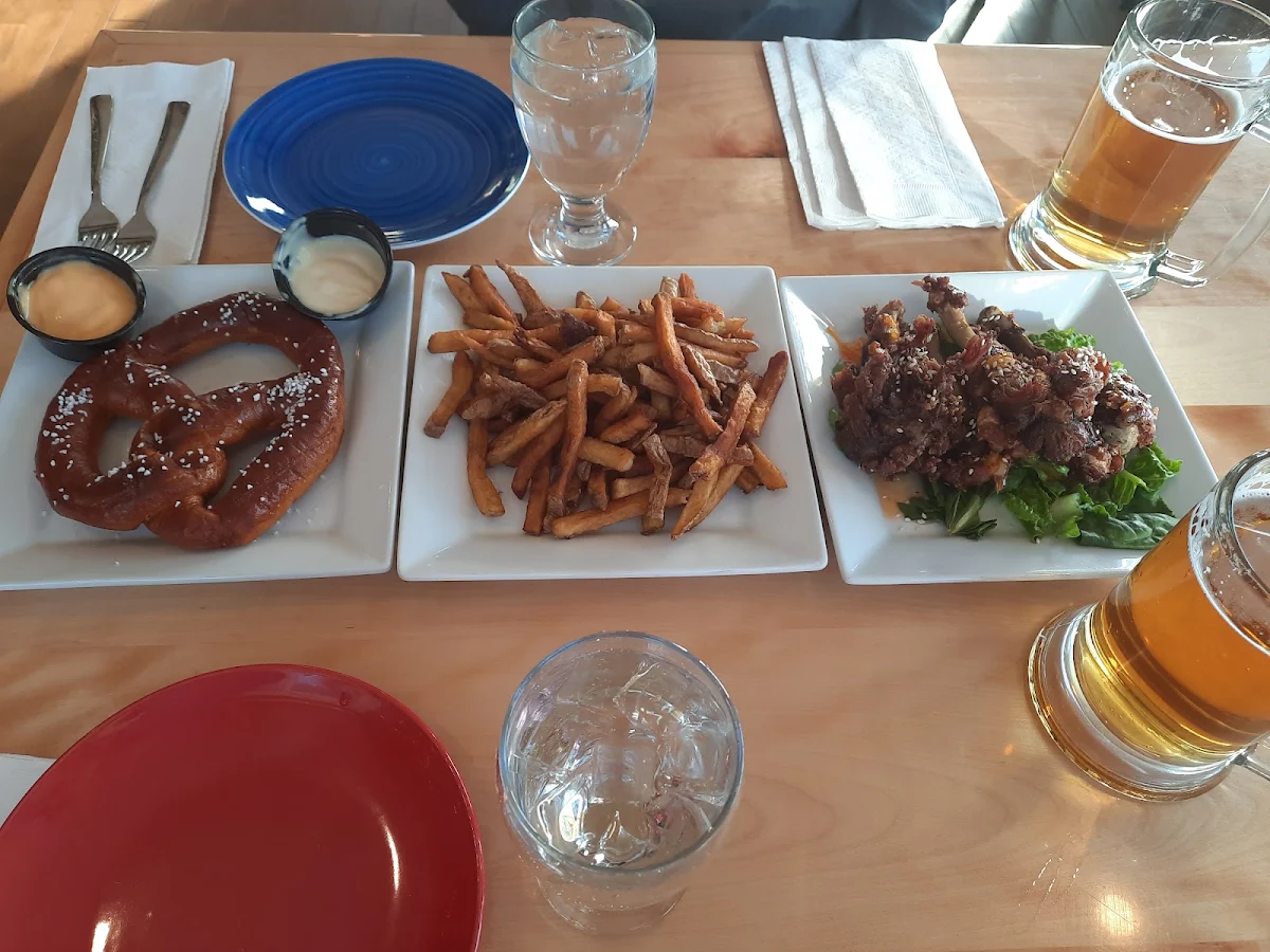 Duck Wings Fries and a Pretzel