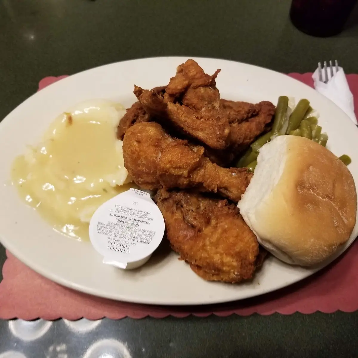 Fried Chicken Dinner with Green Beans Mashed Potatoes and Gravy