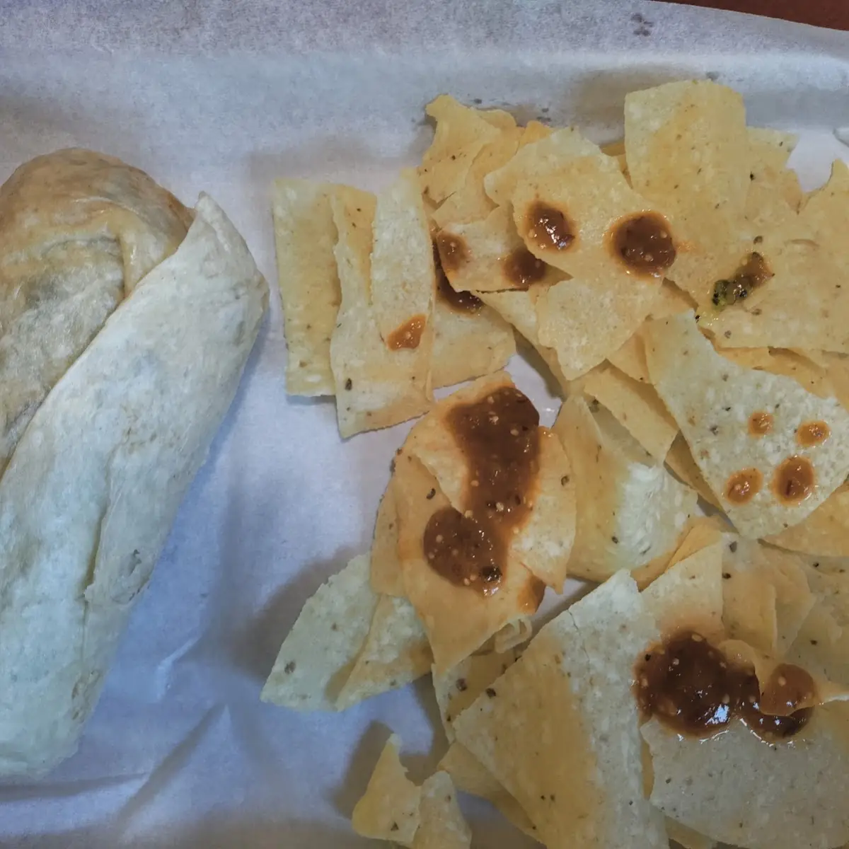 Chicken Burrito with Salsa Sprinkled on Chips