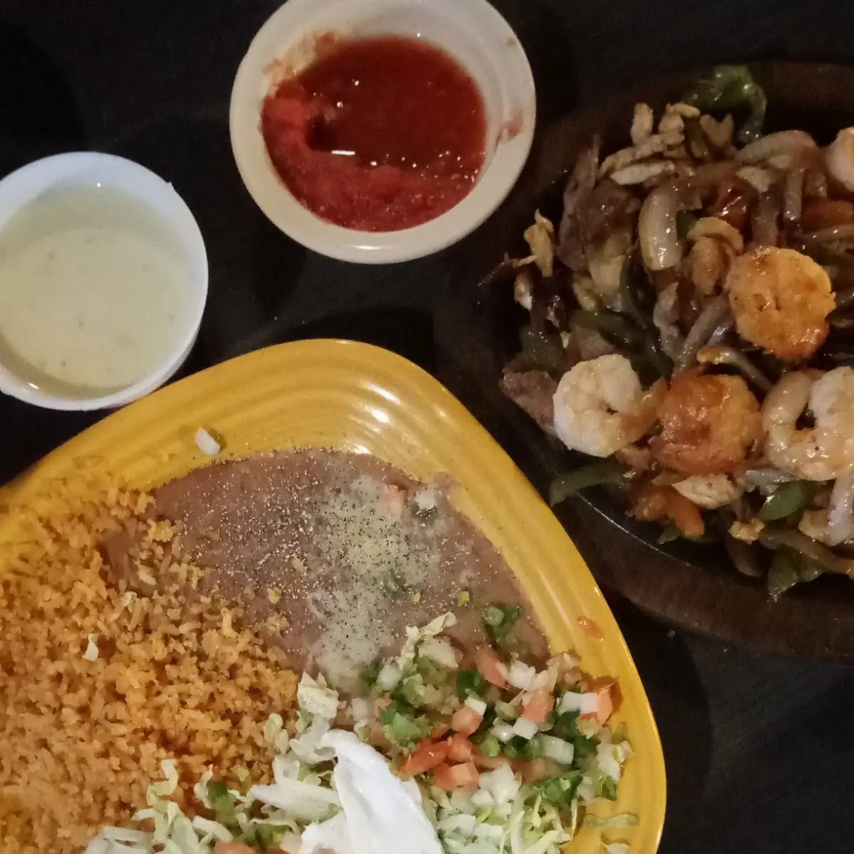 Steak Shrimp Chicken Fajitas