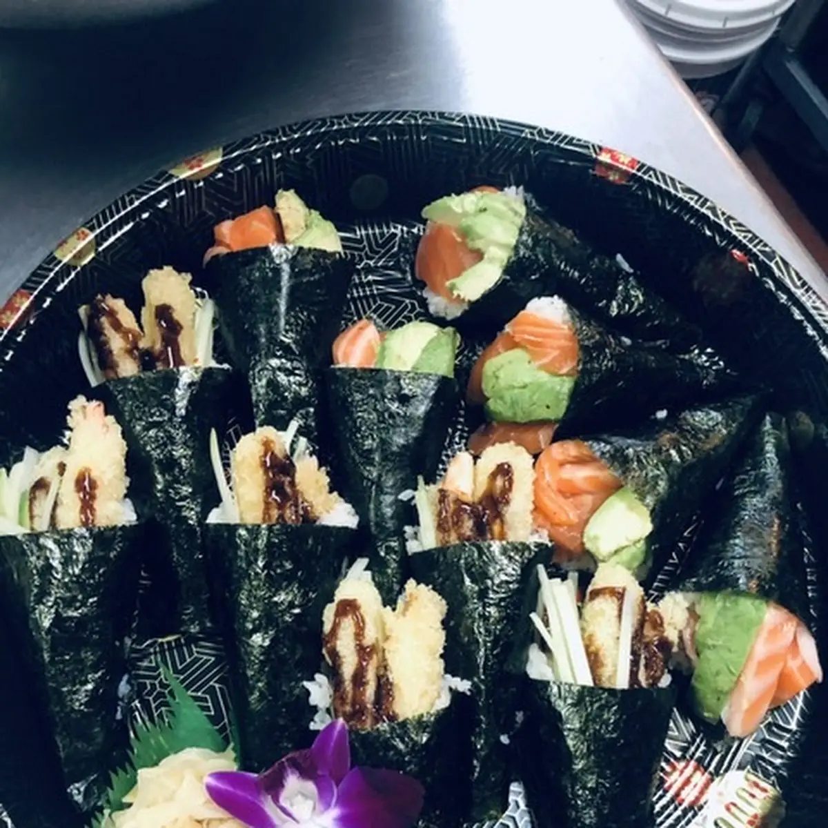 Salmon Avocado Hand Roll and Chicken Tempura Hand Roll