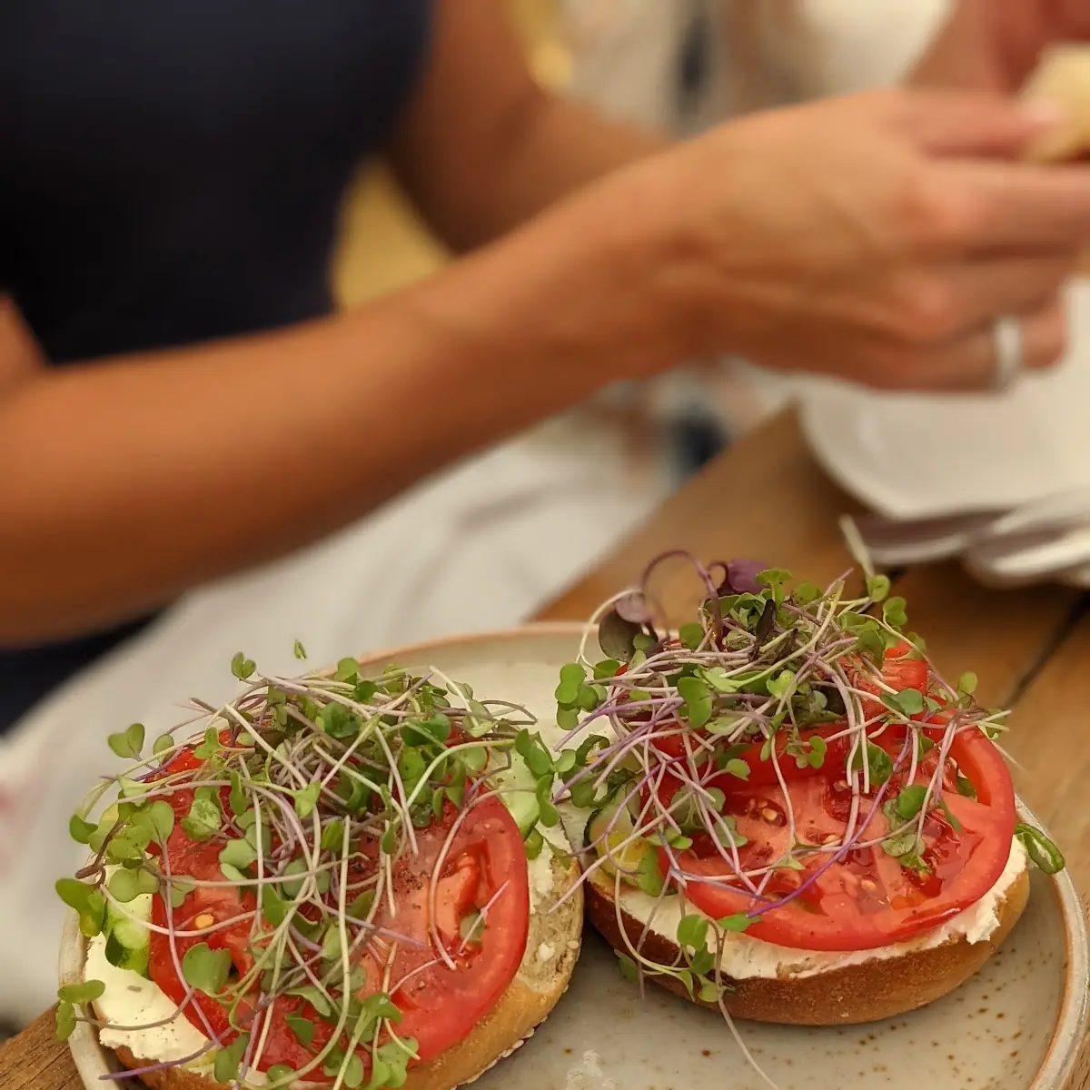 Bagel with Cream Cheese Cucumber and Sprouts