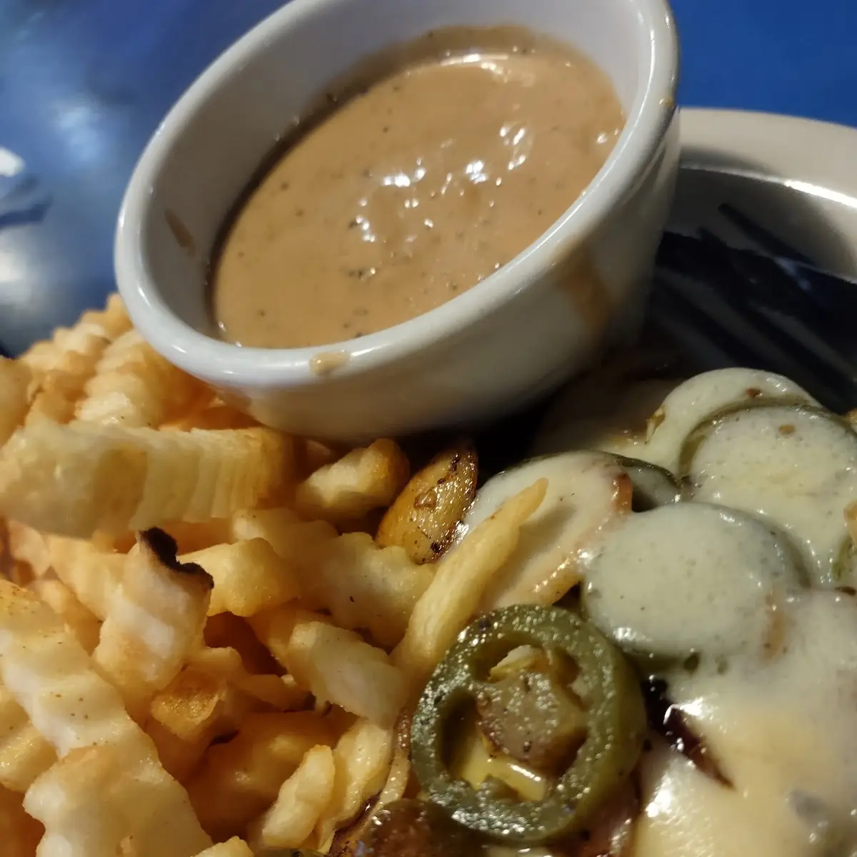 Hamburger Steak with Pepper Gravy and Fries