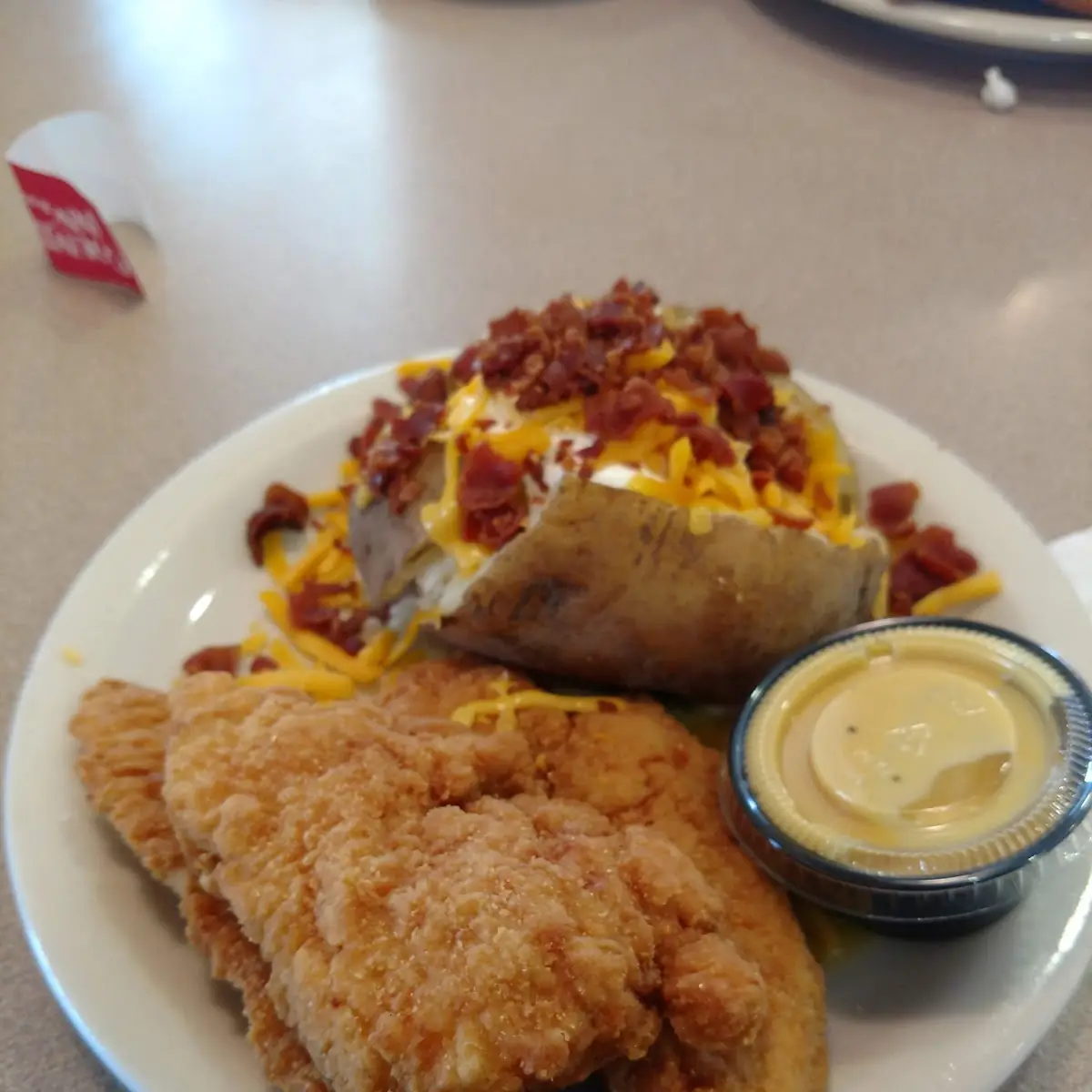 Fish Fillets with Stuffed Baked Potato