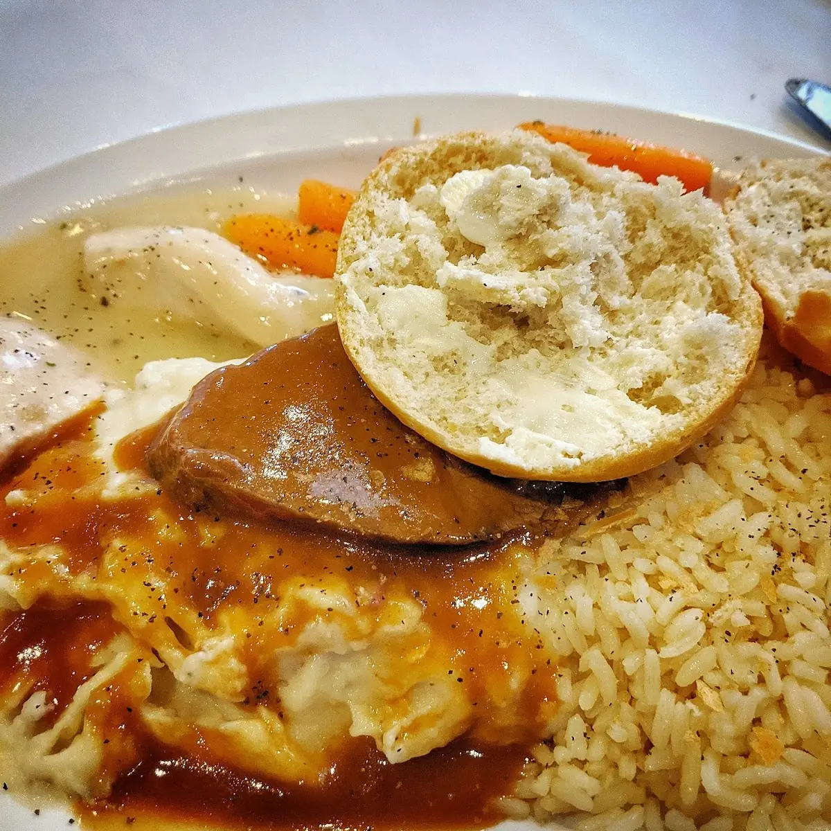 Beef Steak with Mashed Potatoes and Rice