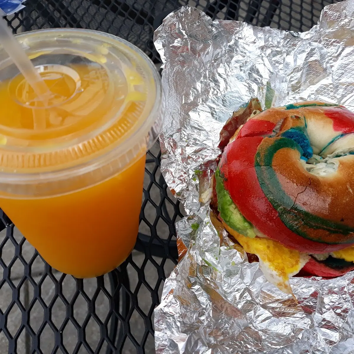 Egg Sandwich with Rainbow Bagel and Fresh Squeezed Orange Juice