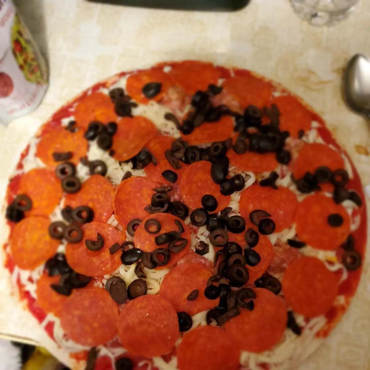 Sausage Pepperoni and Black Olive Pizza