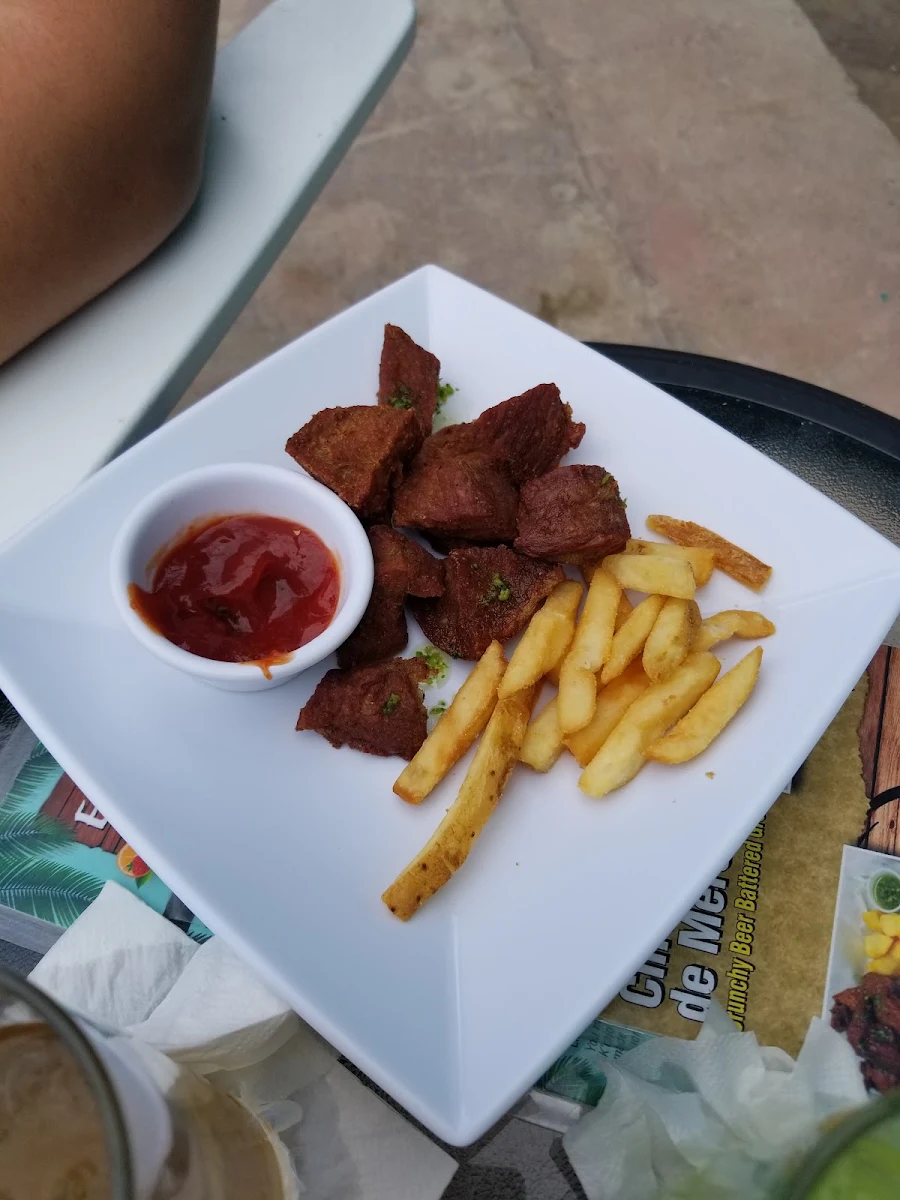 Carne Frita Con Papas Fritas