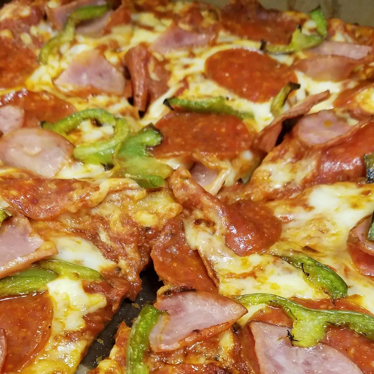 Ham and Pepperoni Pizza with Extra Sauce