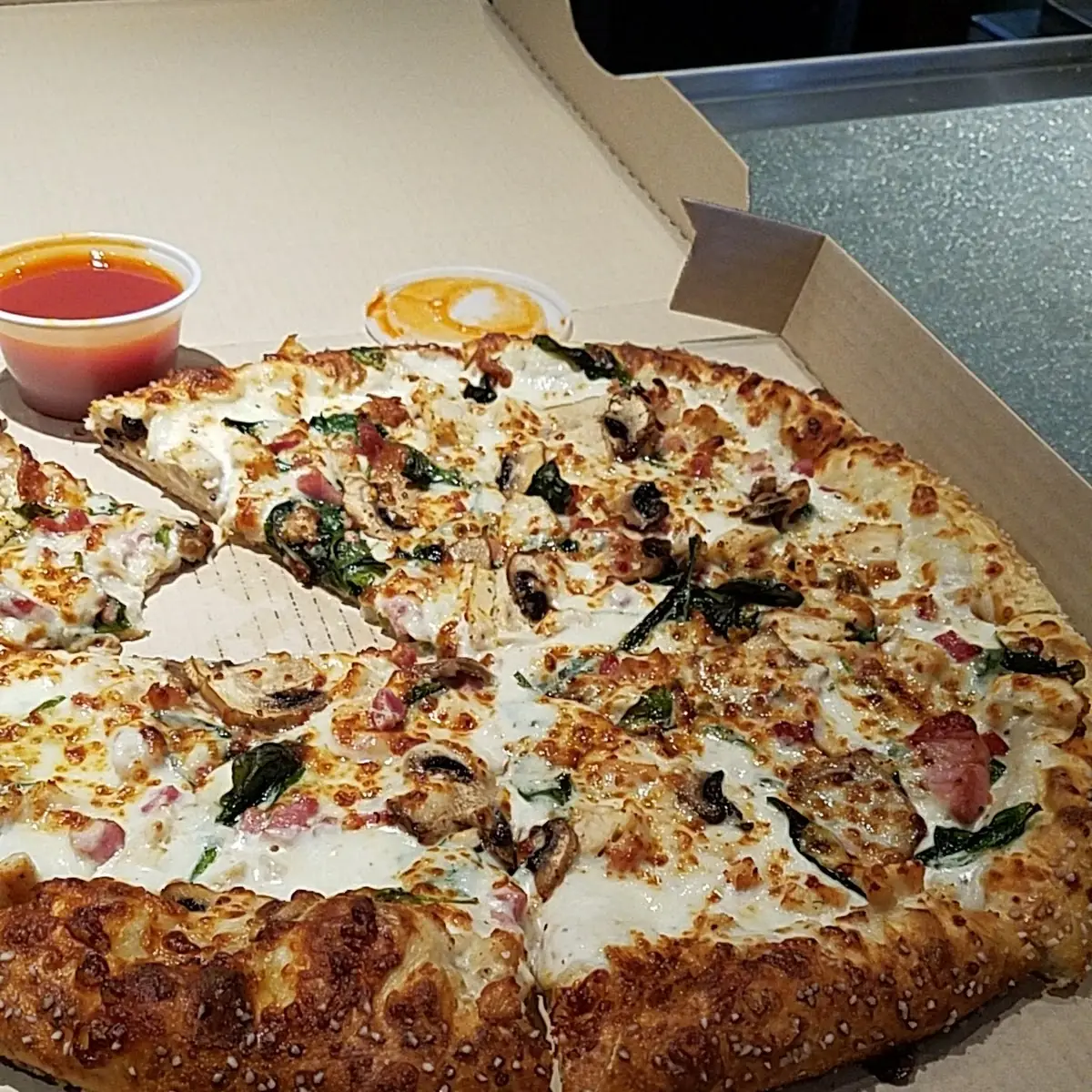 Spinach Bacon Chicken Alfredo Pizza