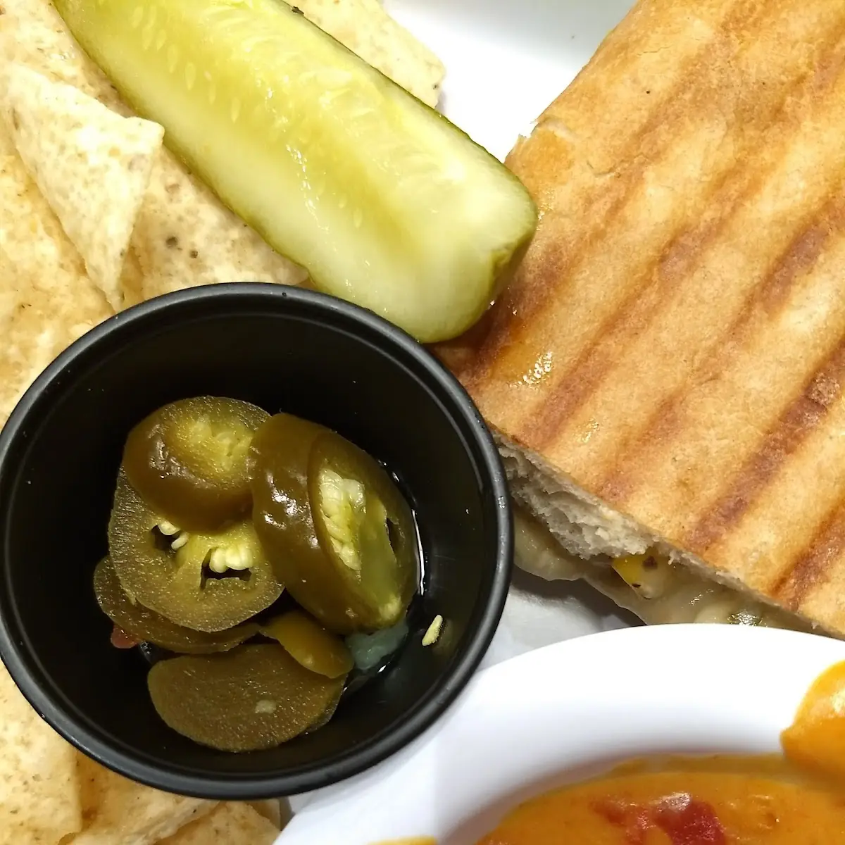 Chipotle Chicken Sandwich and Chips and Queso