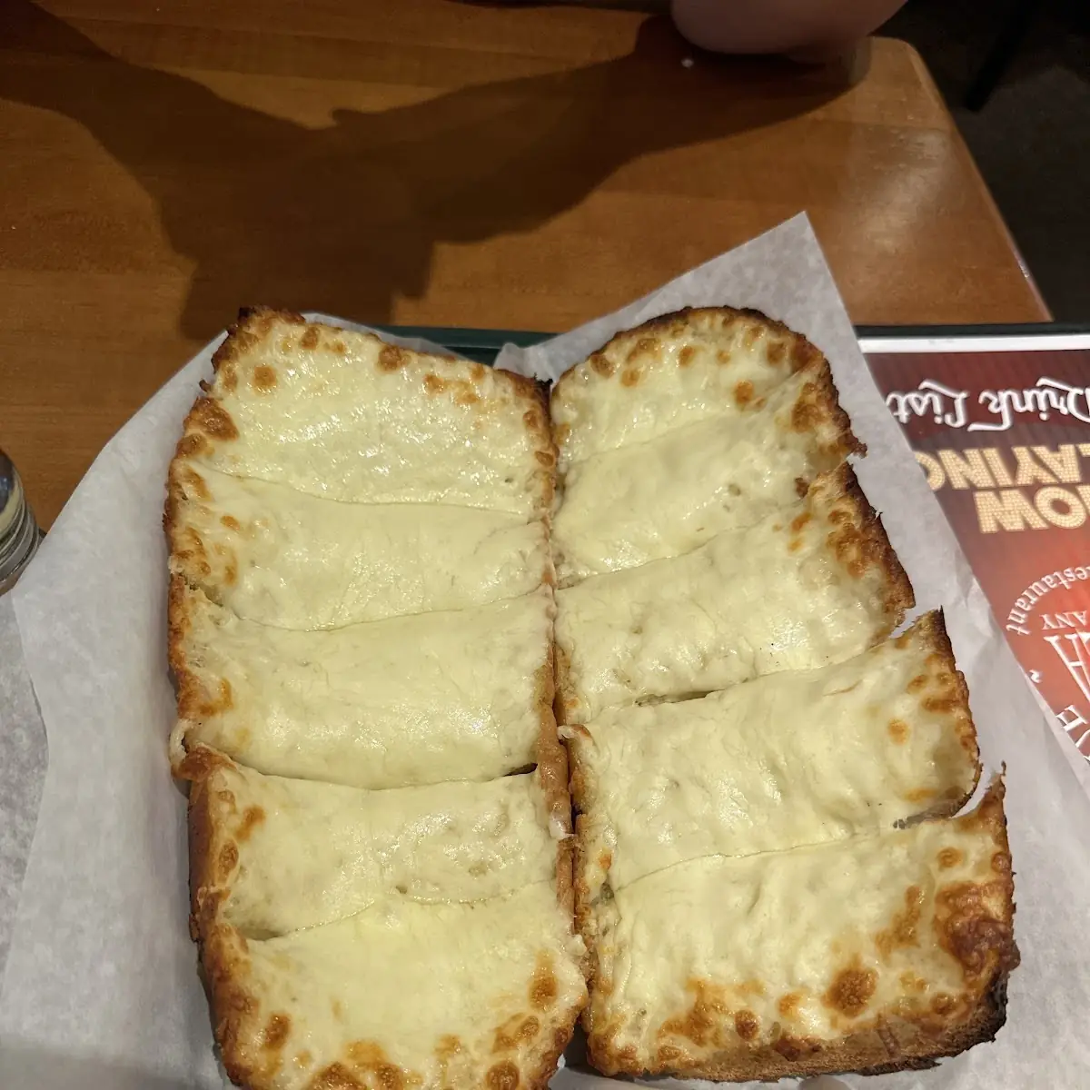 Garlic Cheese Bread Item Called a Lot