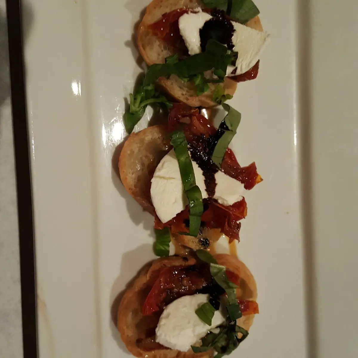 Roasted Tomatoes Fresh Mozzarella Basil and a Balsamic Glaze