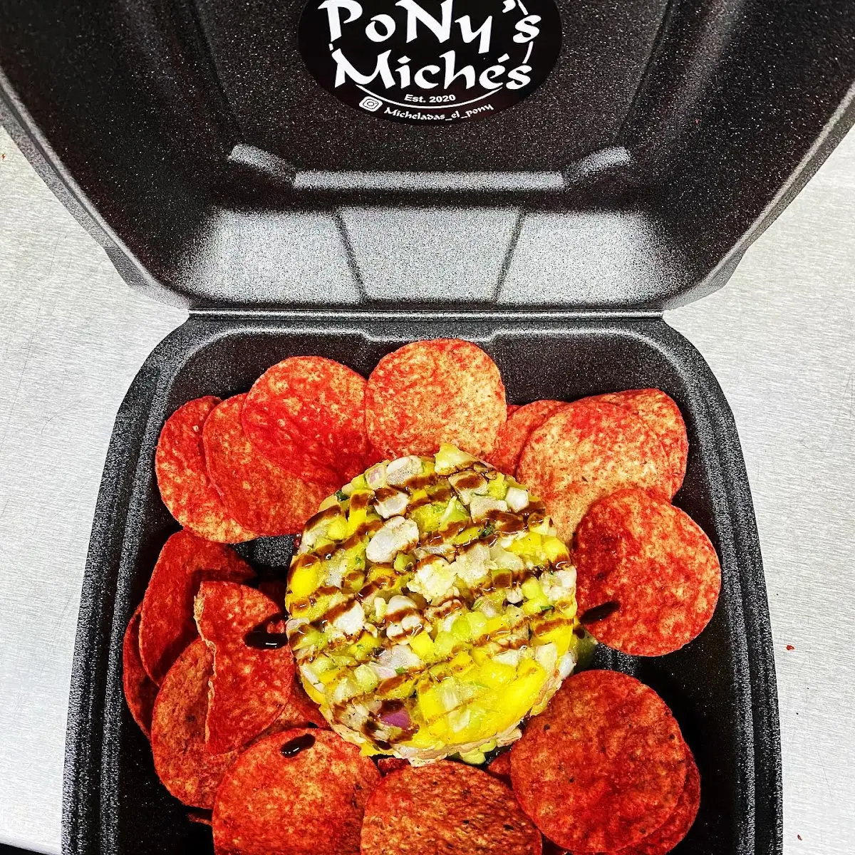 Flaming Hot Mango Habanero Tosticeviche