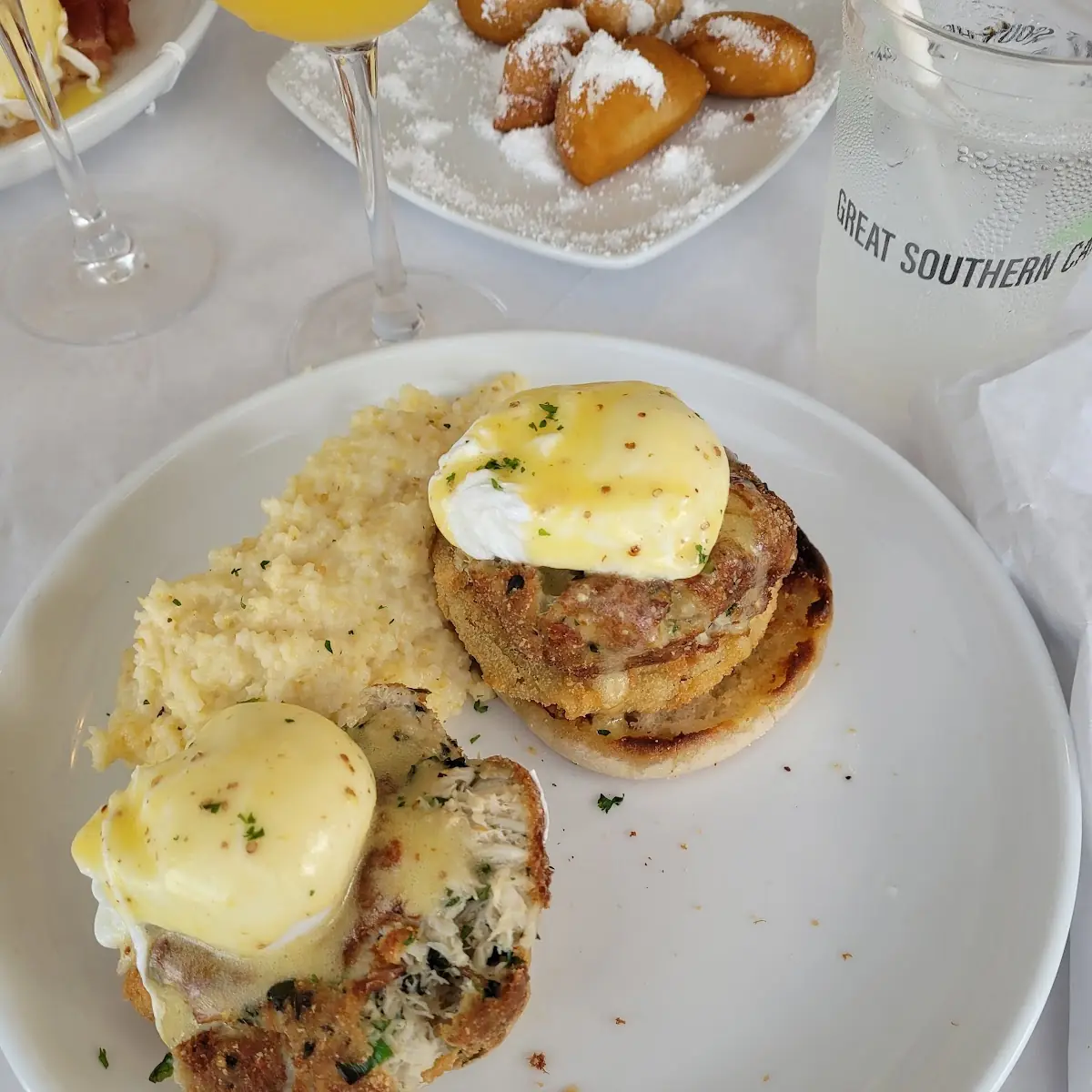 Crab Cake and Fried Green Corned Beef Hash Benedict