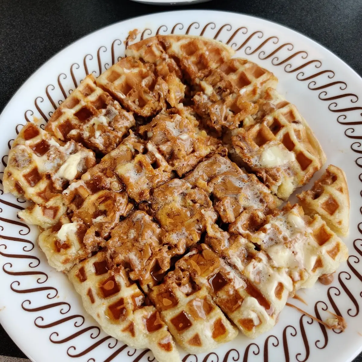 Pecan Peanut Butter Waffles with Butter and Syrup