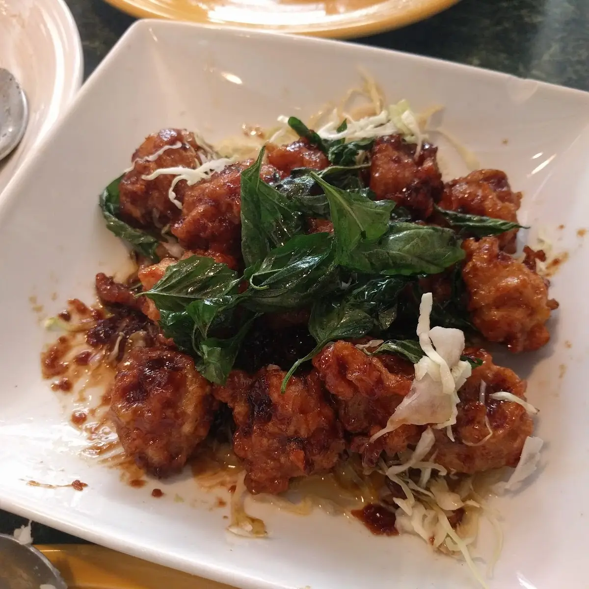Crispy Garlic Chicken with Fried Thai Basil
