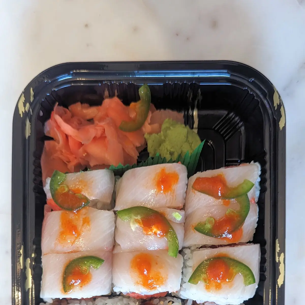 Eel Roll Front Spicy Yellowtail Roll Back