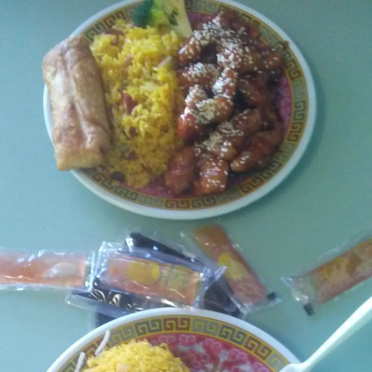 Boneless Ribs with Yellow Rice and a Egg Roll Combo