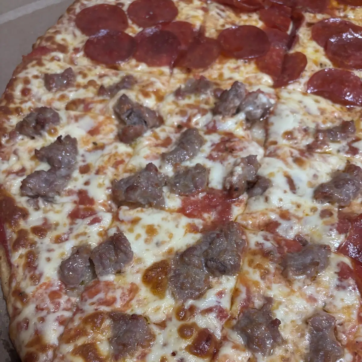 Pepperoni Pizza and Sausage Pizza