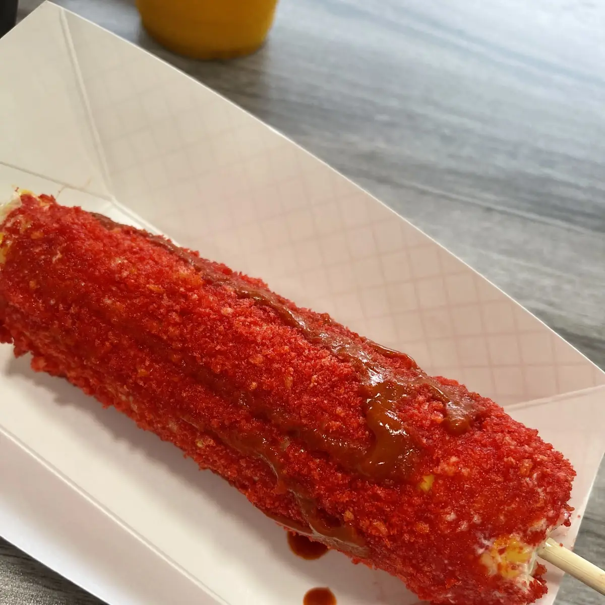 Elote Con Hot Cheetos Corn with Hot Cheetos