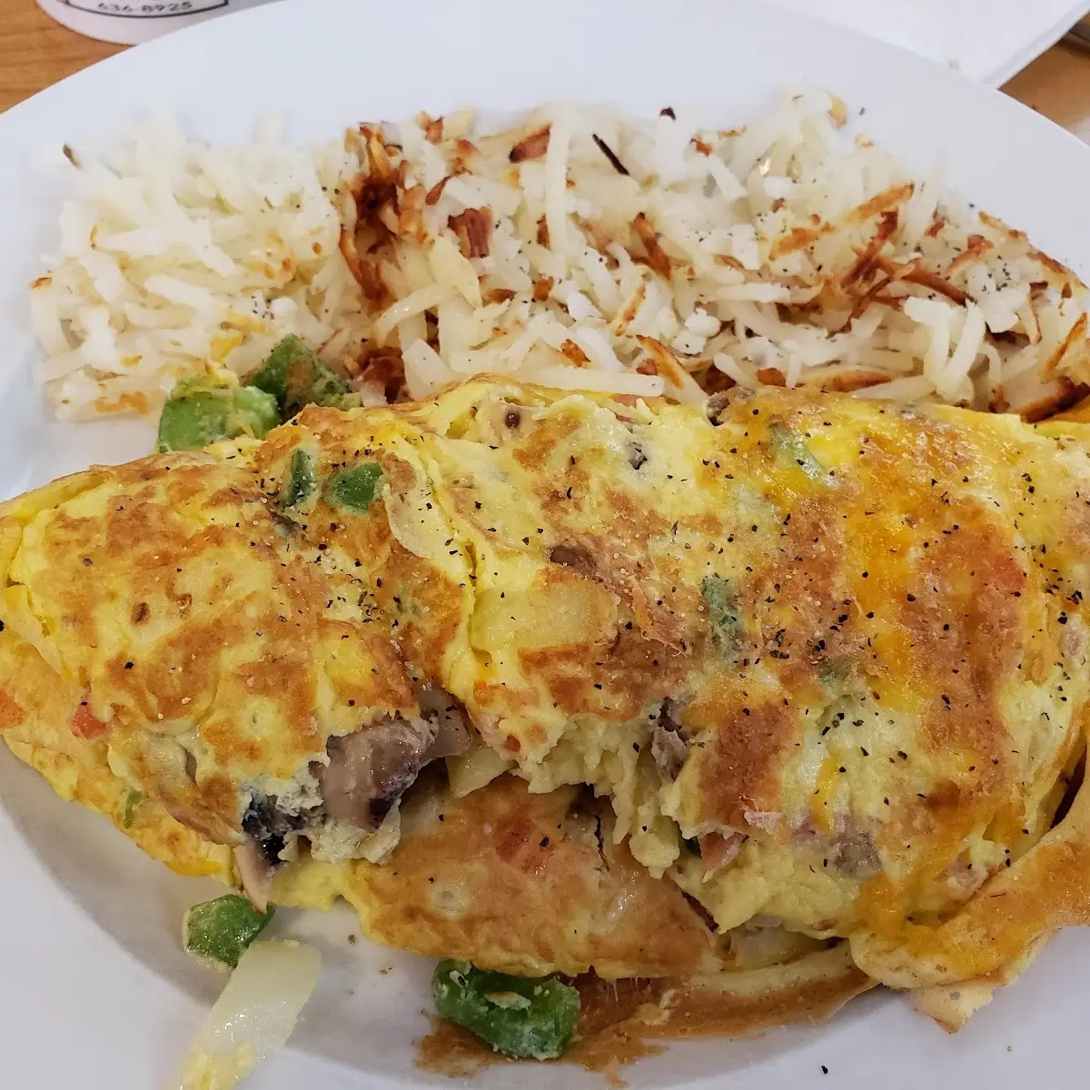 Denver Omelette with Ham Off-The-Bone Melted Cheddar Cheese Green Peppers and Onions
