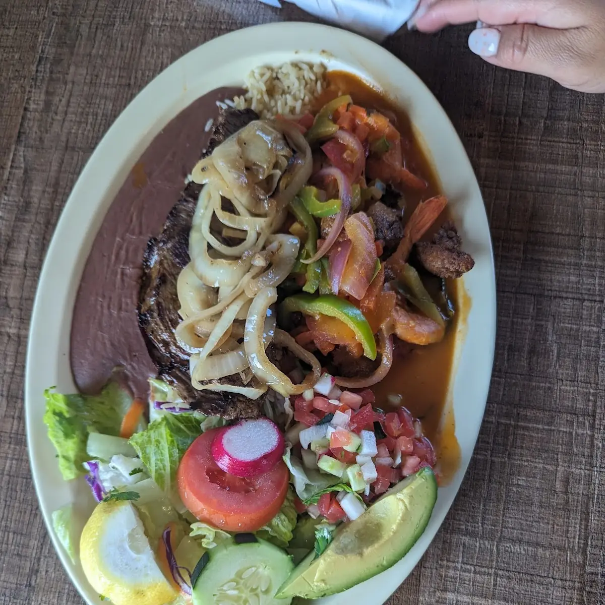 Bistec Encebollado