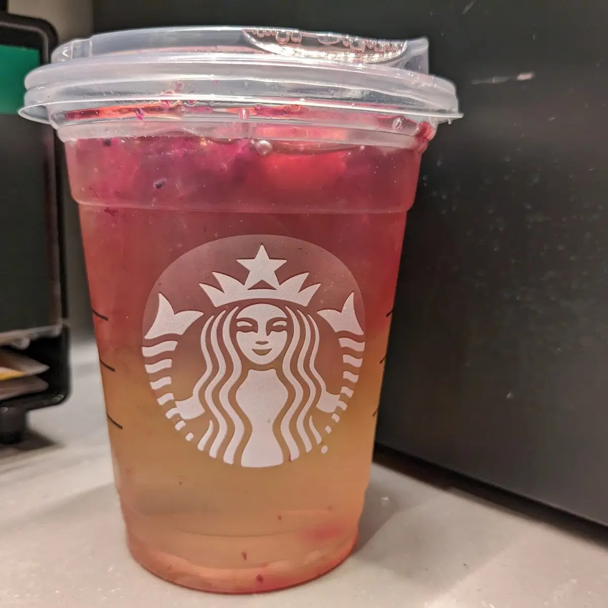 Mango Dragonfruit Starbucks Refreshers Beverage Light Water Add Peach Juice Berries on Top