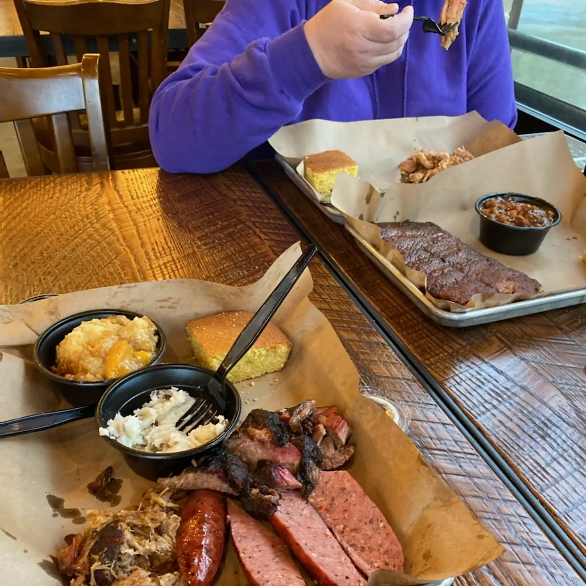 3 Meat Sampler Brisket Pork Sausage with Mashed Potatoes and Peach Cobbler
