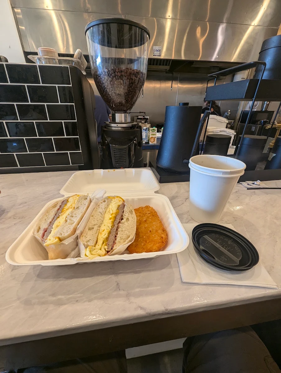 Bacon Sausage and Egg Sandwich with Hash Brown