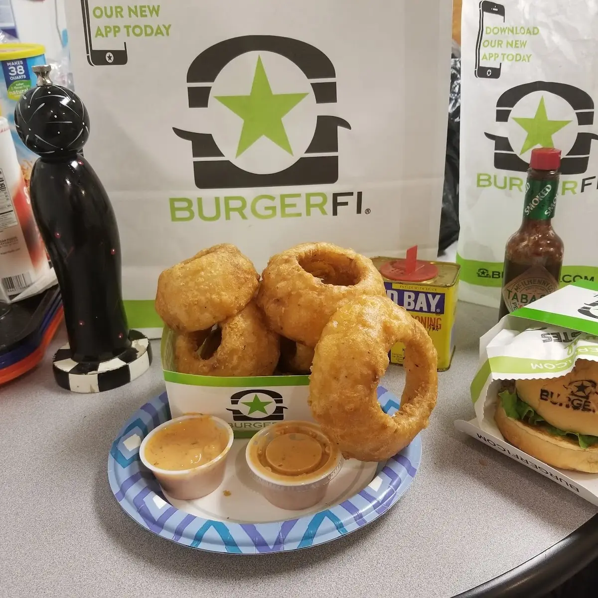 Burgerfi Cheese Burger and Onion Rings