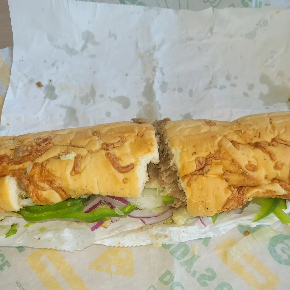 Steak Sandwich with Extra Onions and Extra Green Peppers