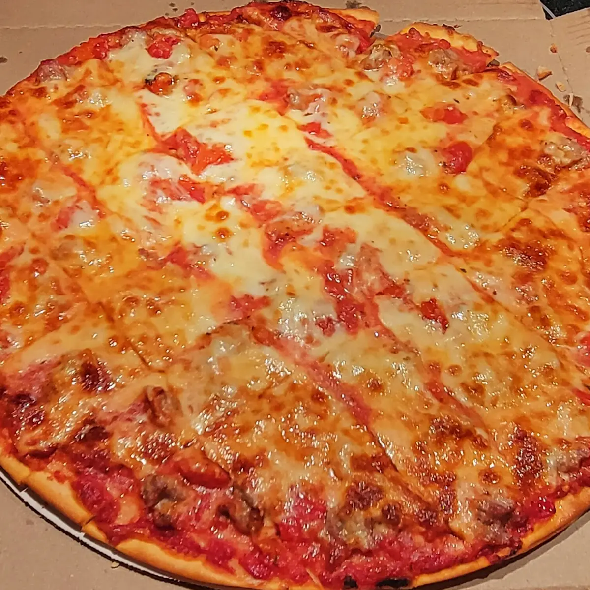 Thin Crust Pizza with Sausage and Roasted Red Pepper