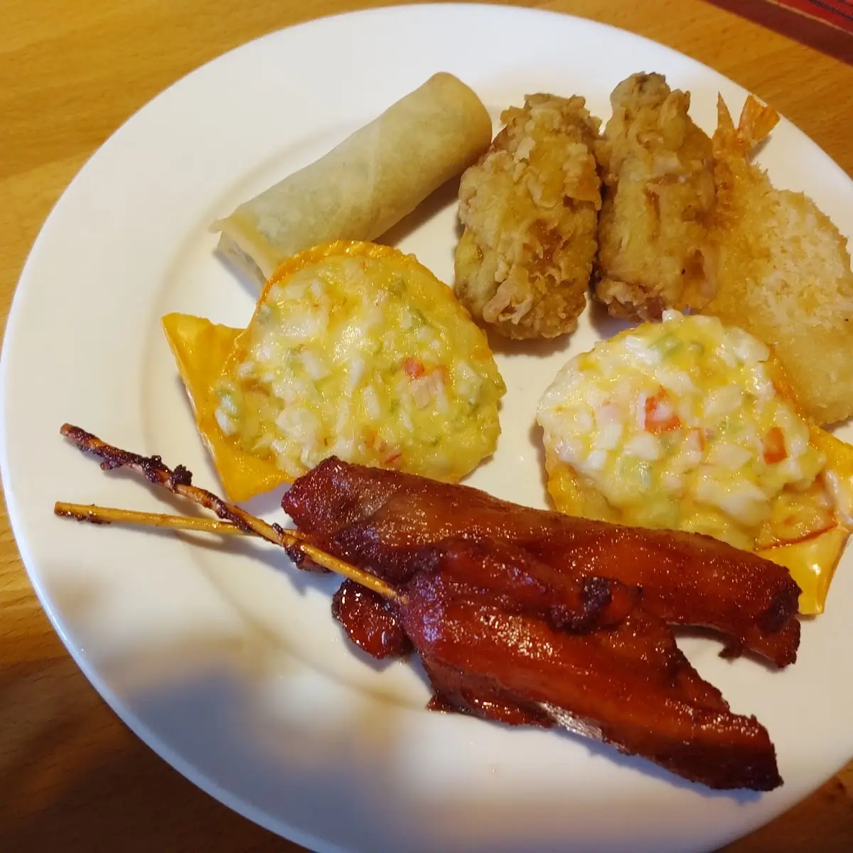 Chinese Chicken on a Stick Stuffed Crab Shells in Spring Roll