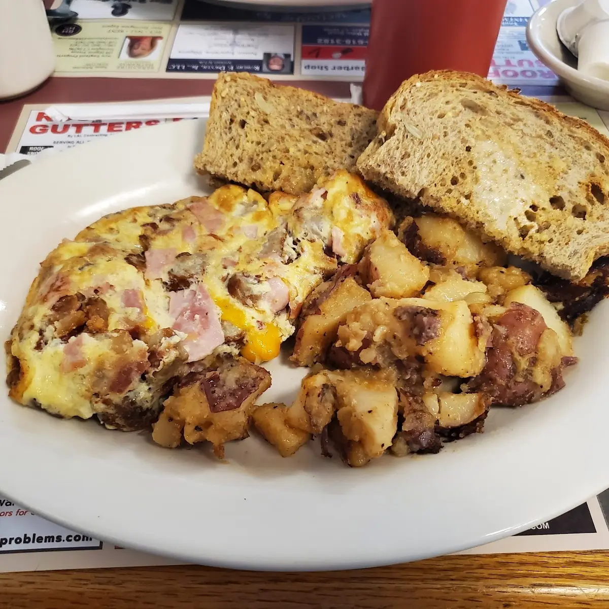 Rick's Combo 1 Bacon Sausage Ham and Cheddar Omelet