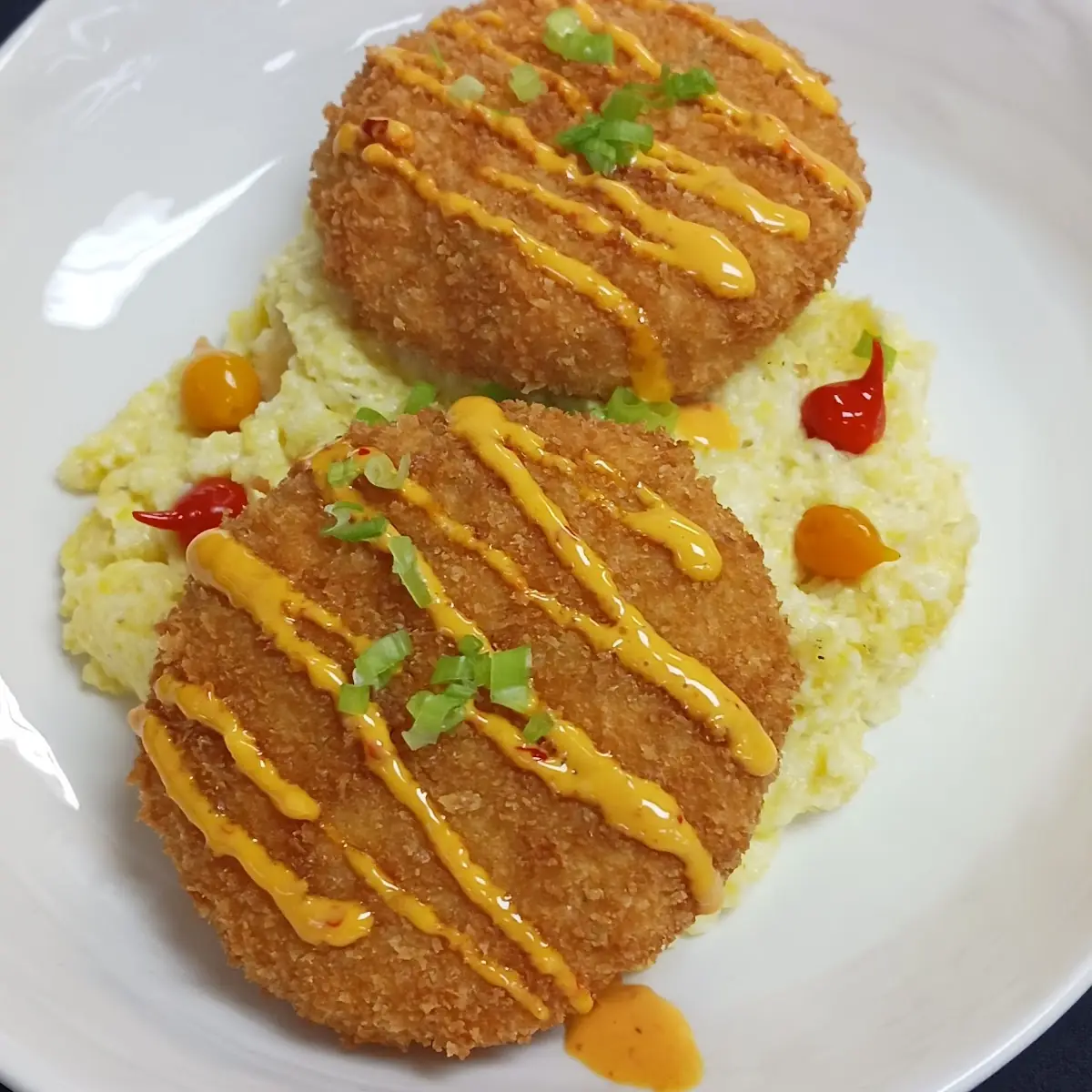 Fried Salmon Cakes over Grits