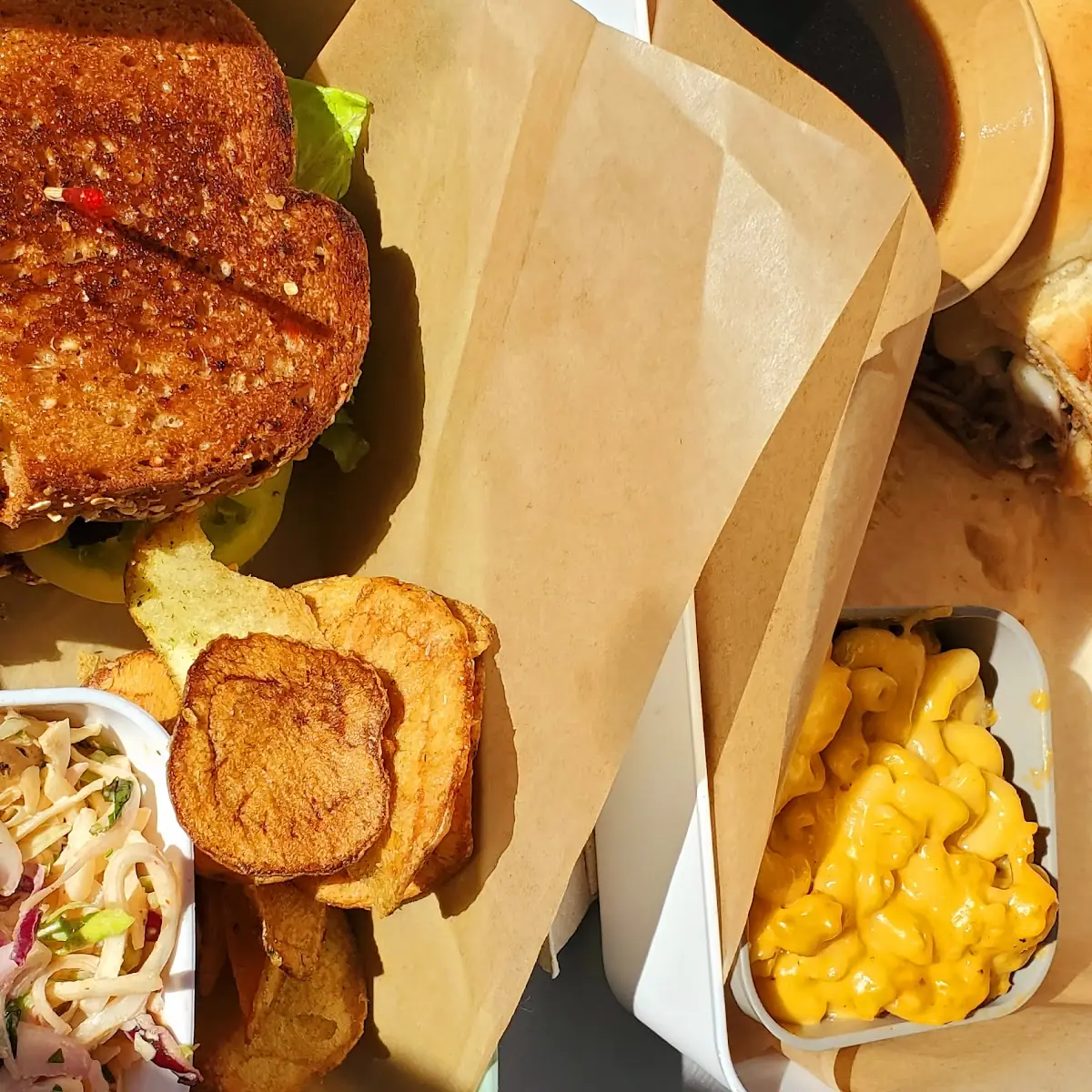 French Dip w Mac and Cheese & Chicken Chopped with Green Tomatoes and Bacon Jam w Slaw