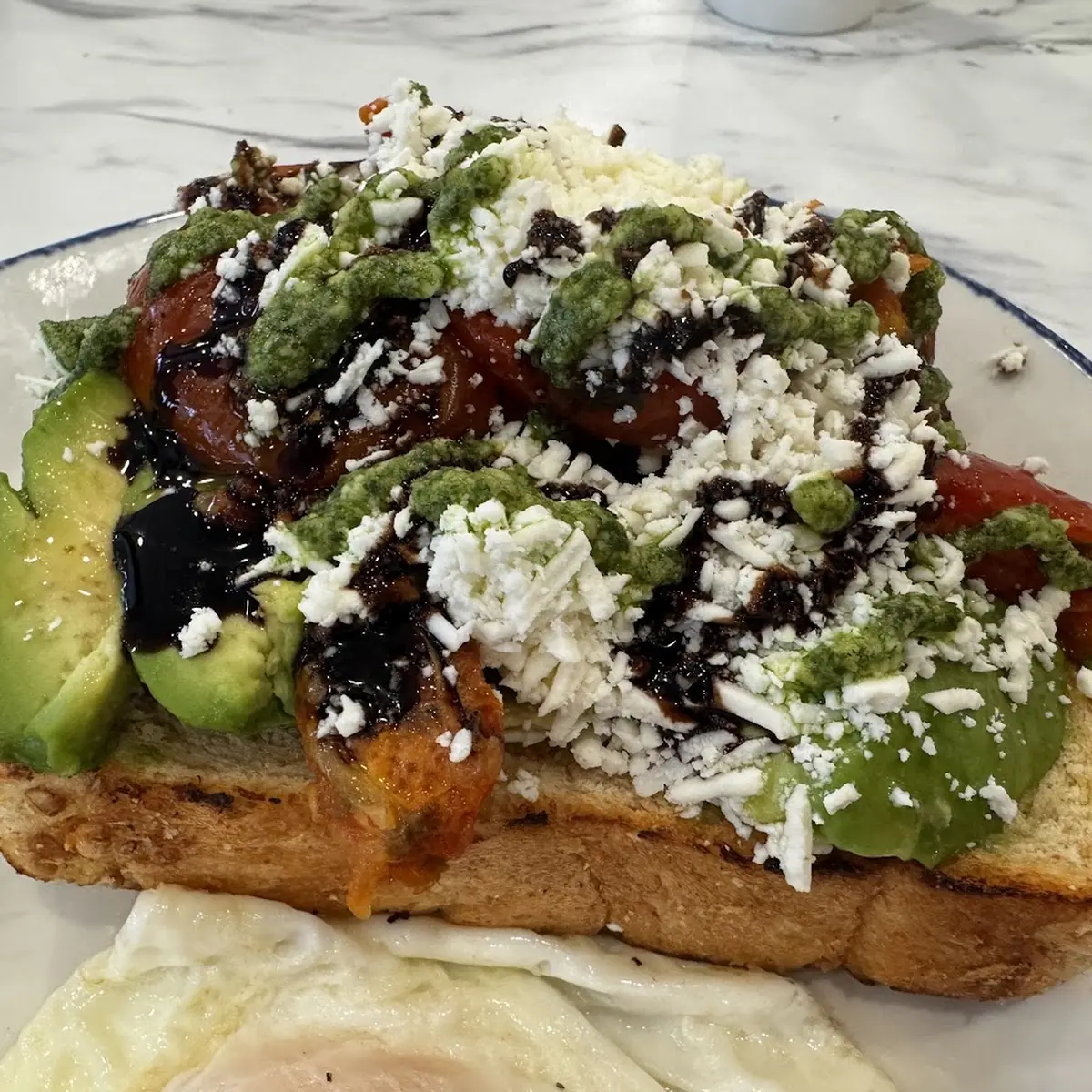 Greek Avocado Toast and Eggs Any Style