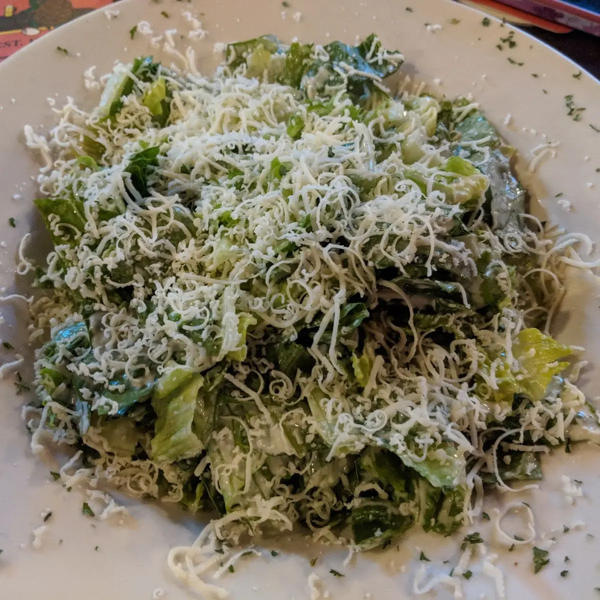 Shrimp Scampi over Caesar Salad