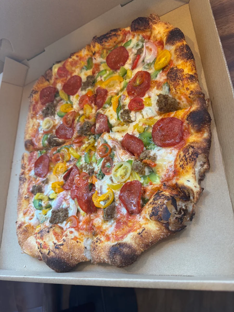 Slice Sausage and Spinach Pizza