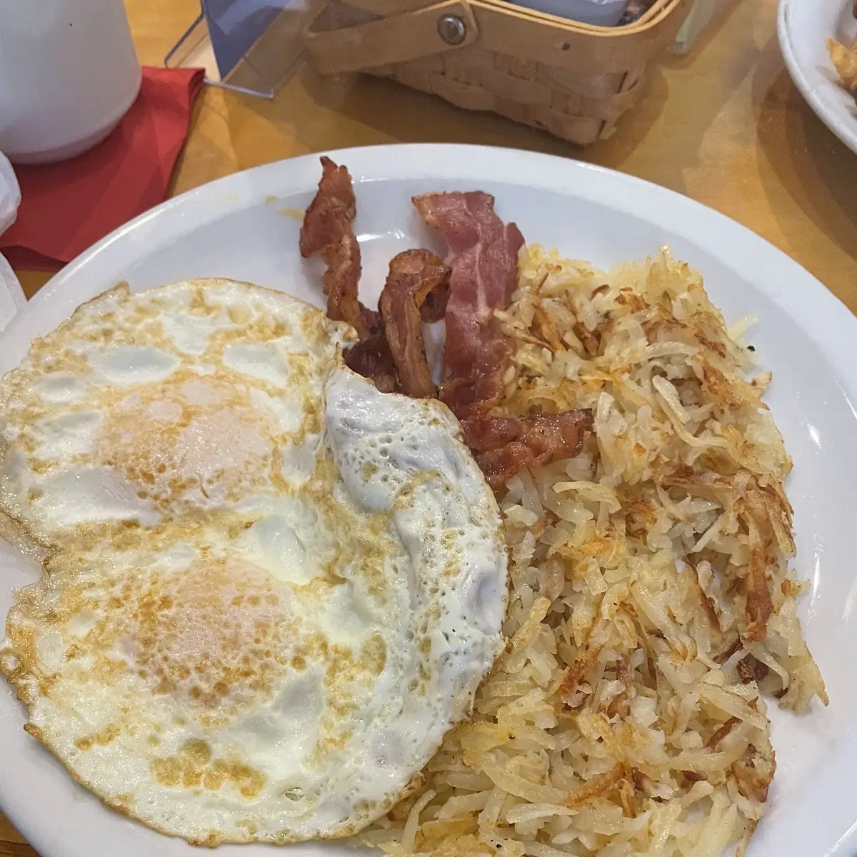 Eggs over Medium Bacon Hash Browns and Sourdough Toast